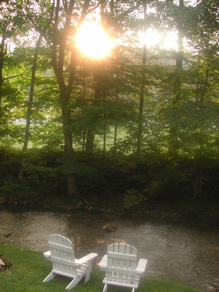 Adirondack Chairs by the Stream